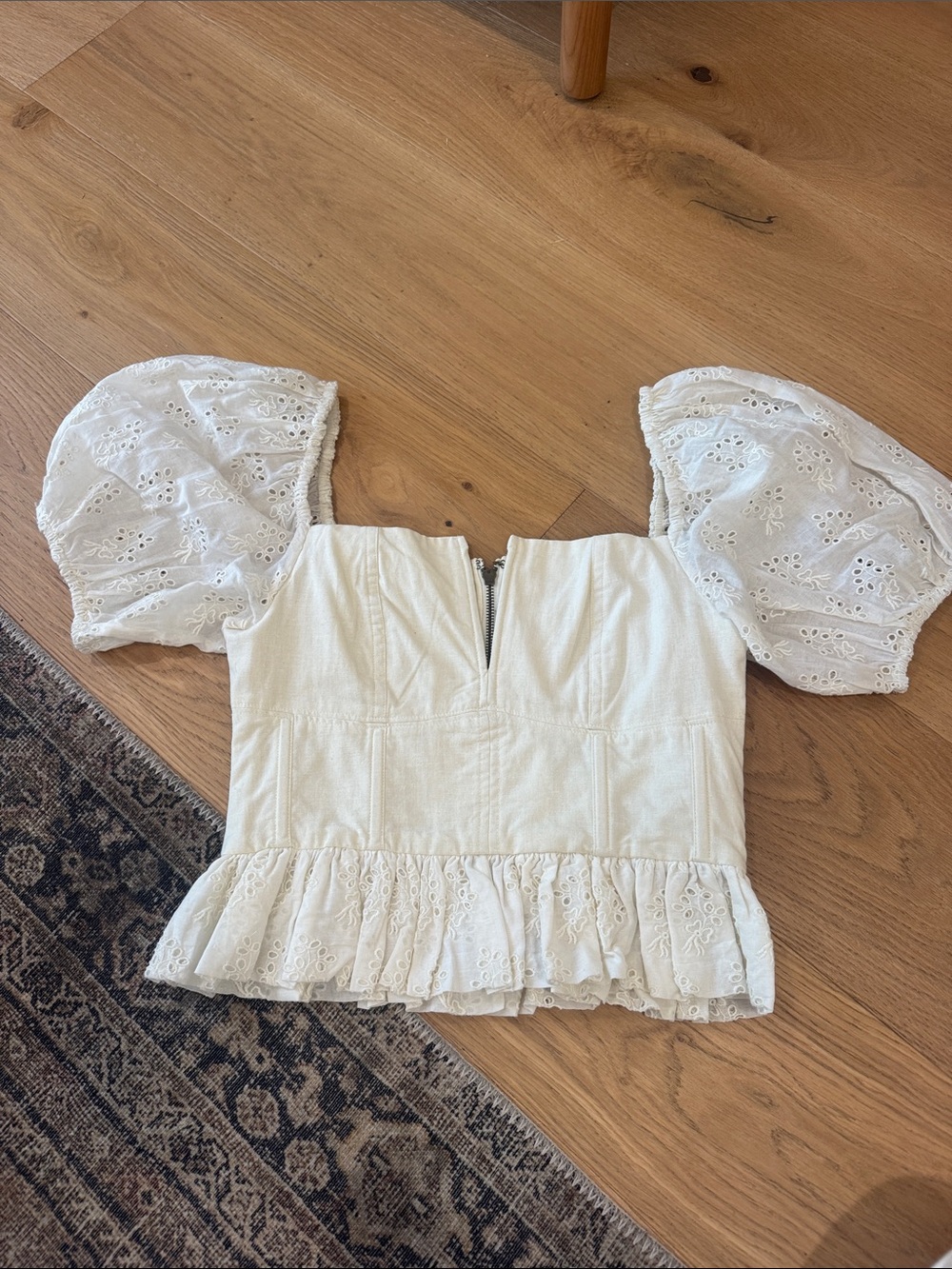 THE GREAT. White Eyelet Puff Sleeve Peplum Top